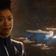 The critically damaged Enterprise is dragged away in Star Trek: Discovery season 2's premiere.